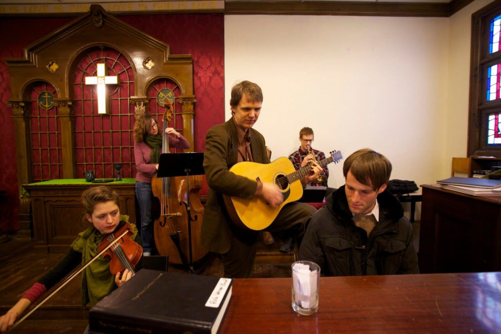 Picture of a band performing during Sunday Service. 